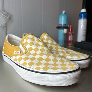 Yellow checkered vans. Size 11 in women's and 9.5 in men's. Worn once or twice.